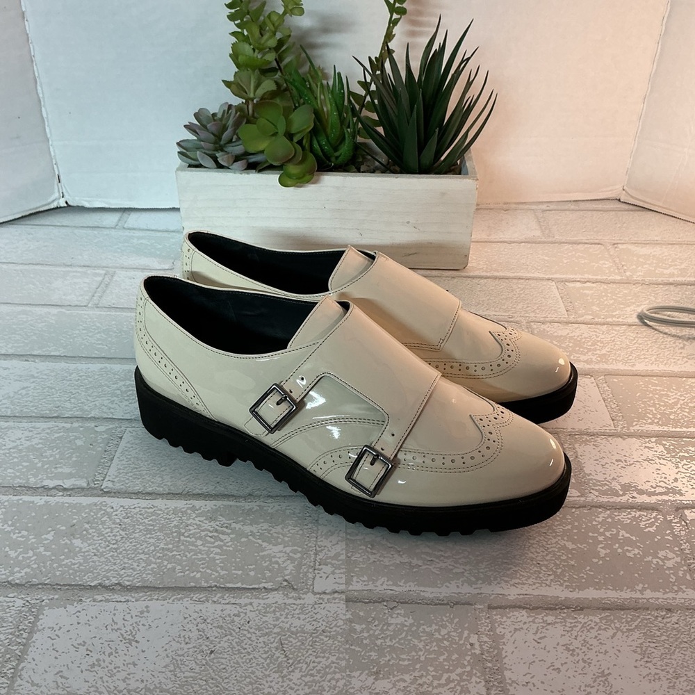 Franco Sarto Cream Patent Loafers with Black Soles